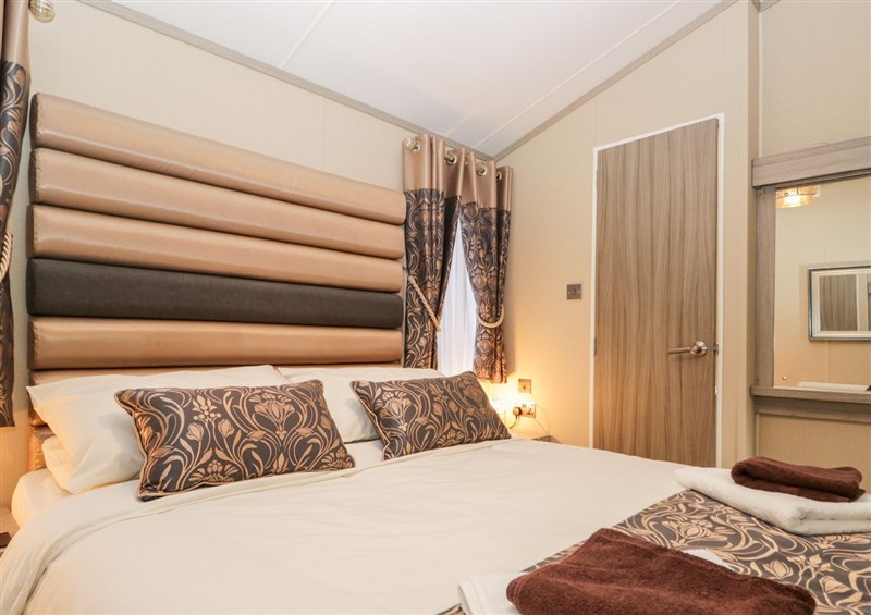 One of the bedrooms at Waters Reach, White Cross Bay Holiday Park near Troutbeck Bridge