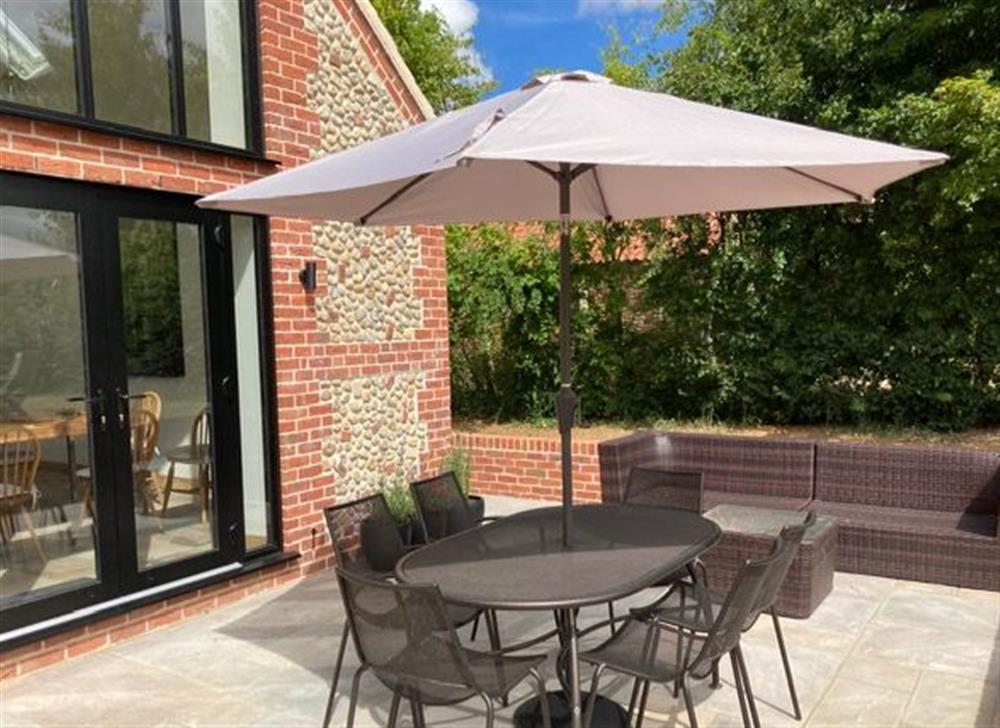 A second outdoor dining area at Waterside Barn, Binham near Fakenham