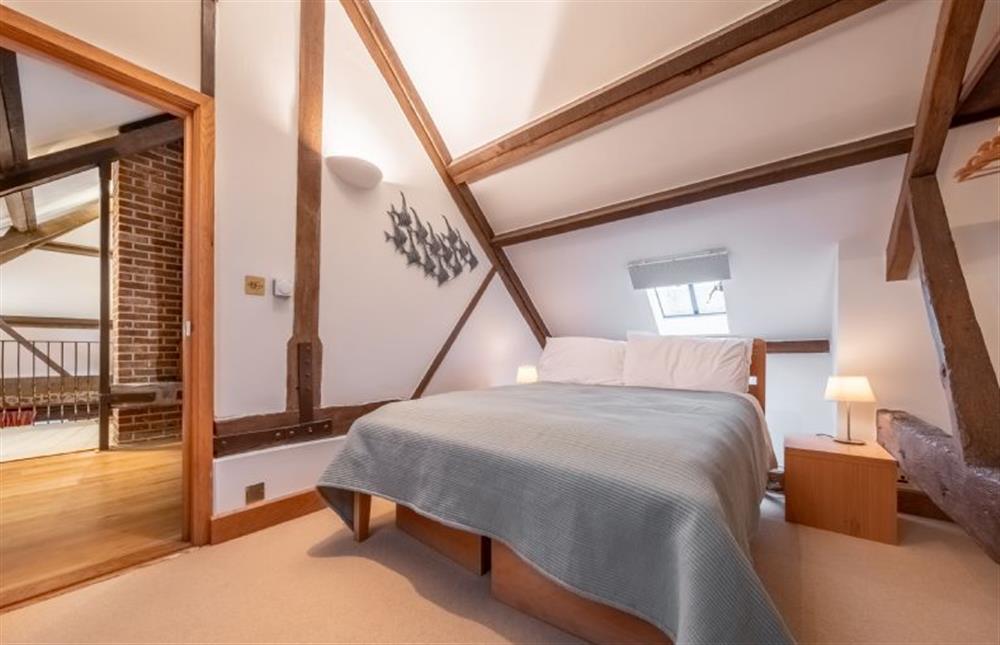 Bedroom two with double bed at Waterside Barn, Binham near Fakenham