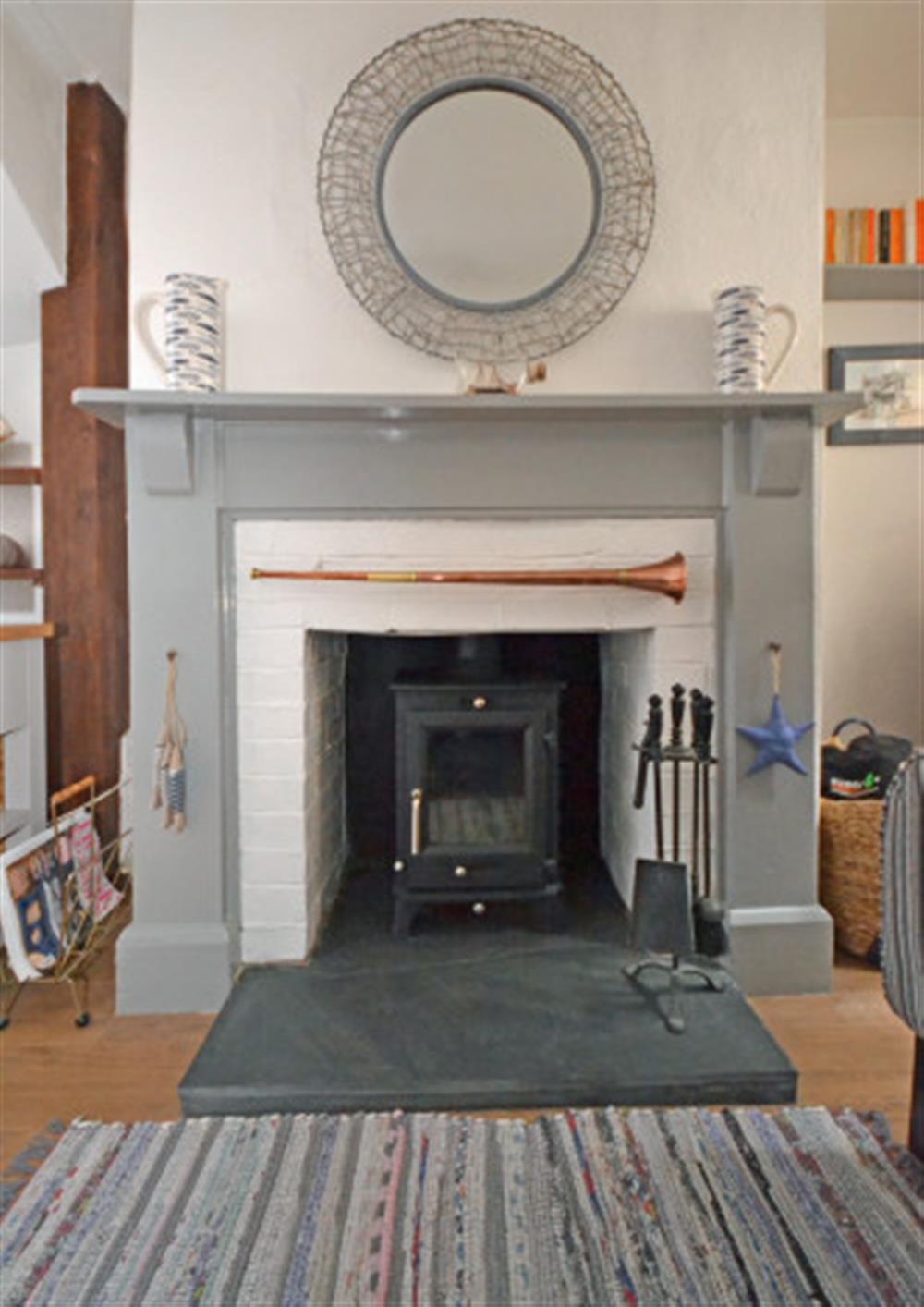 Log burner for chilly nights. at Waterside Cottage in Appledore