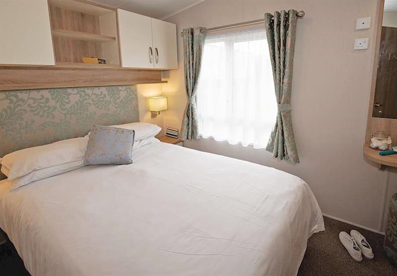 Double bedroom at Avonmore 3 at Waterside Holiday Park and Spa in Weymouth, Dorset