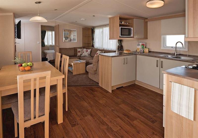 The kitchen and living room in Provence at Waterside Holiday Park and Spa in Weymouth, Dorset