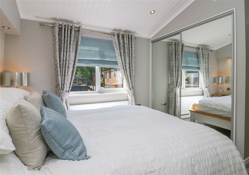 A bedroom in Waterside Lodge (photo 2) at Waterside Lodge, 55A Bowness