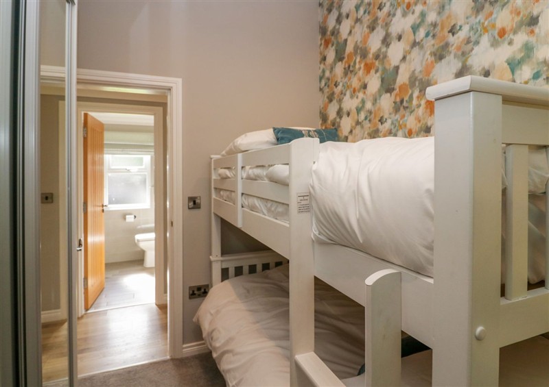 A bedroom in Waterside Lodge (photo 4) at Waterside Lodge, 55A Bowness