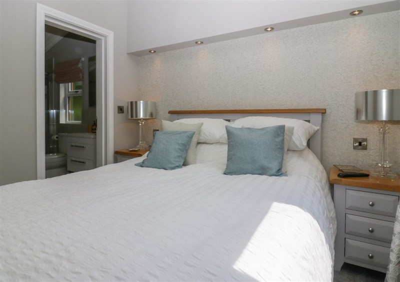 A bedroom in Waterside Lodge at Waterside Lodge, 55A Bowness