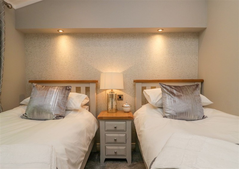 This is a bedroom (photo 2) at Waterside Lodge, 55A Bowness