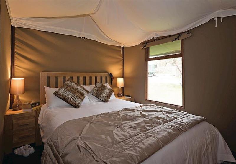 Bedroom in Exclusive Safari Tent 2 at Waterside Safari Tents in Weymouth, Dorset