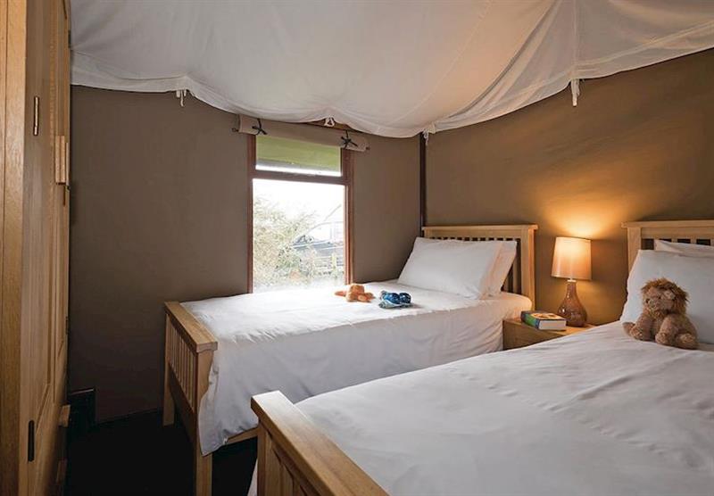 Twin bedroom in the Safari Tent 3 at Waterside Safari Tents in Weymouth, Dorset