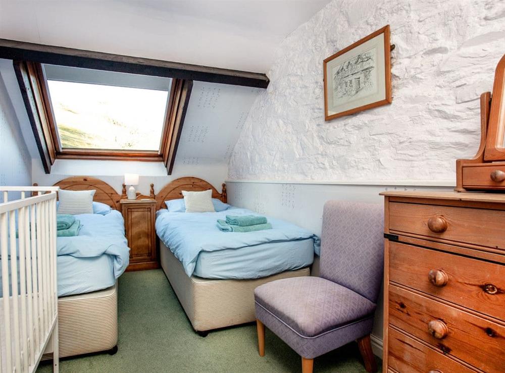 Comfortable twin bedroom with cot at Waterwheel in Bow Creek, Nr Totnes, South Devon., Great Britain