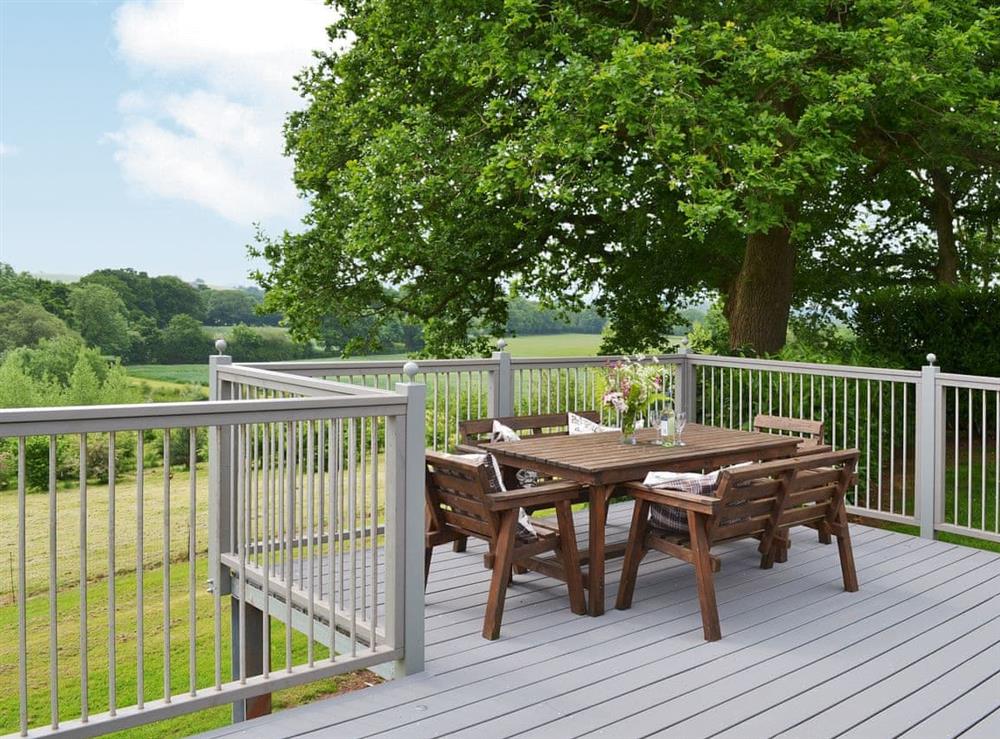 The decking is a great place for an outdoor meal at Wattles in Tiverton, Devon