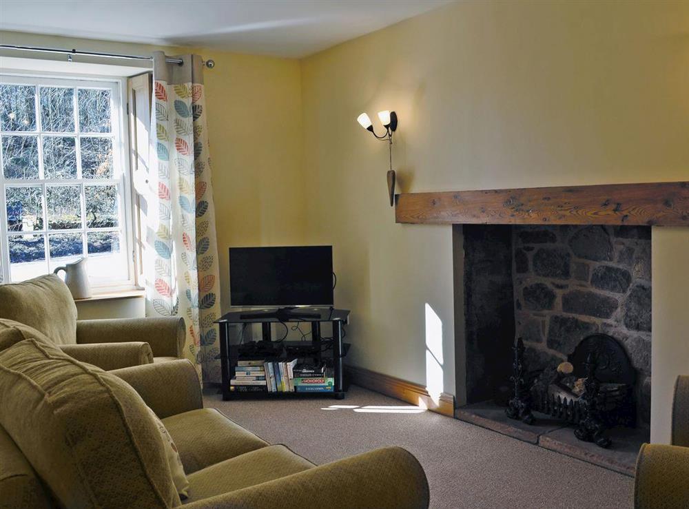 Homely living room at Waulkmill Cottage in Carronbridge near Thornhill, Dumfriesshire