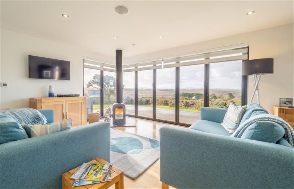 Stunning sitting room with smart television and state-of-the-art wood burning stove at Wavelength, Chapel Porth, St Agnes