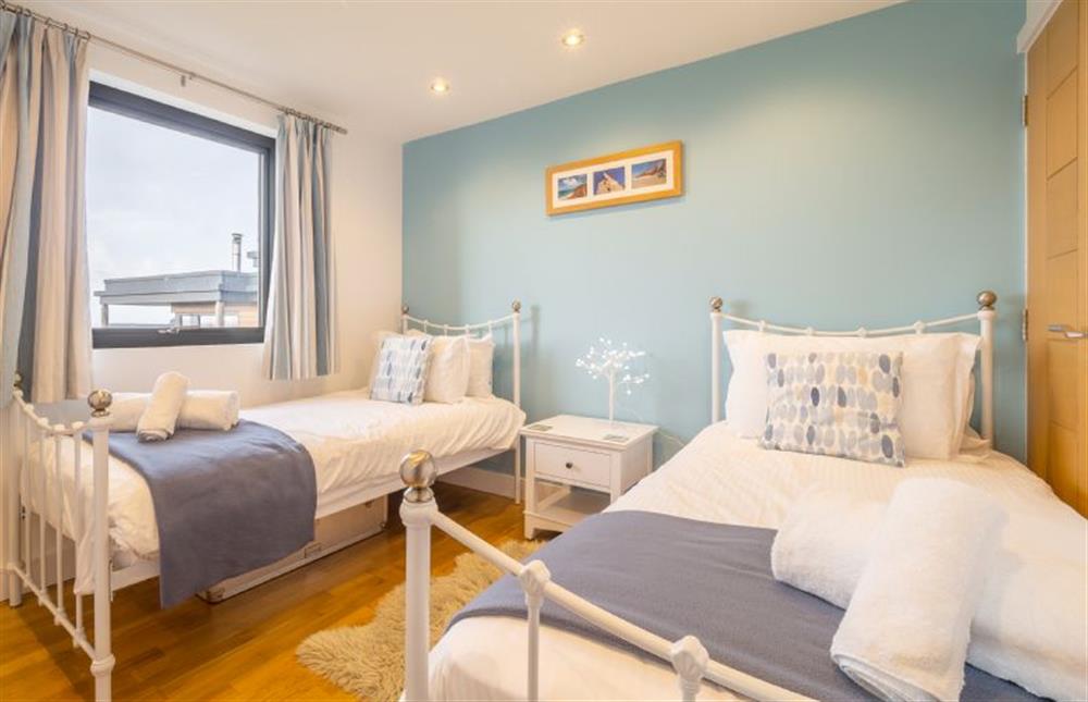 Wavelength, St Agnes. Bedroom two with twin single beds at Wavelength, Chapel Porth, St Agnes