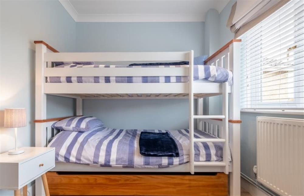 Bedroom three with full-size bunk beds at Waveney House, Wells-next-the-Sea