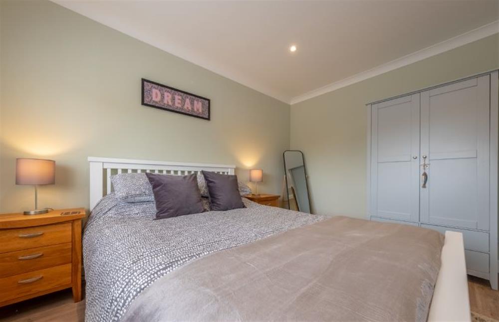 Bedroom two with king-size bed at Waveney House, Wells-next-the-Sea