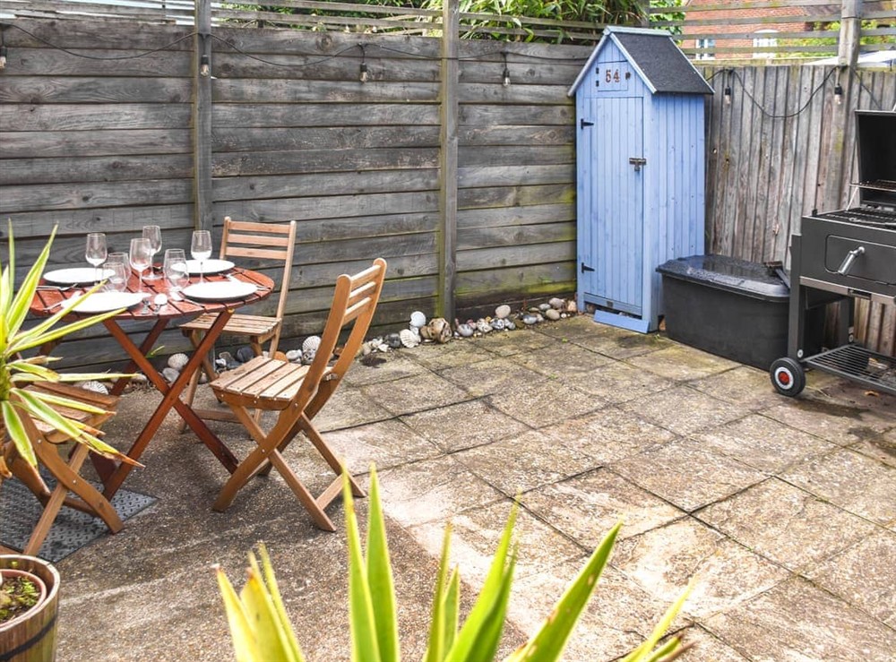 Outdoor eating area at Waverley Cottage in Mundesley, Norfolk