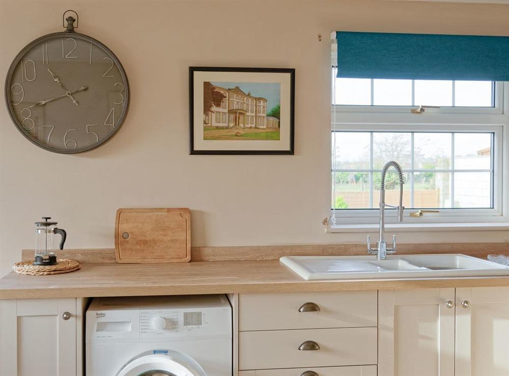 Well-equipped fitted kitchen at Waves and Wolds in Sewerby, near Bridlington, North Humberside