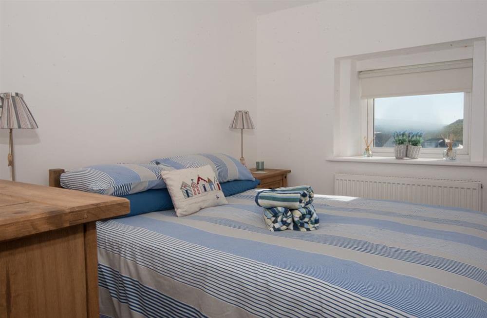 This is a bedroom at Waves at Ocean House in Caernarfon, Gwynedd
