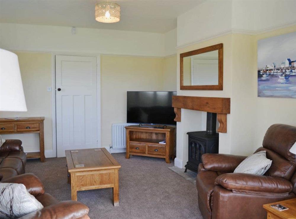 Spacious living room with patio doors (photo 2) at Wayside in Beadnell, Northumberland