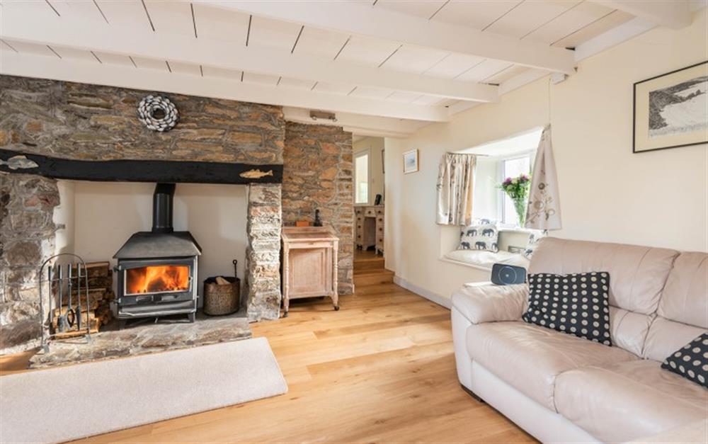 Cosy lounge with log burner  at Wayside in Hope Cove