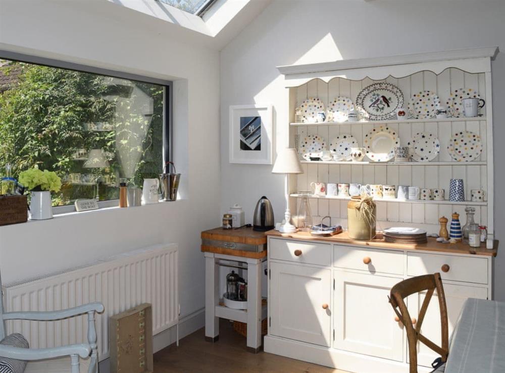Light and airy open plan area with traditional furniture at Weald in Salcombe, Devon