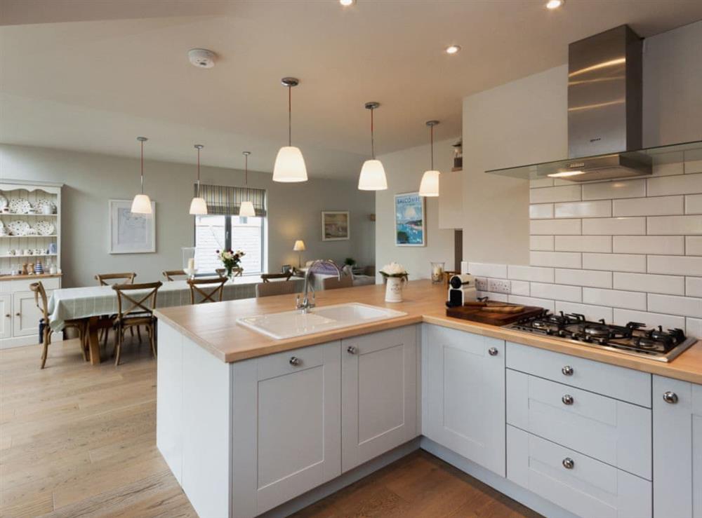 Well-equipped kitchen area at Weald in Salcombe, Devon