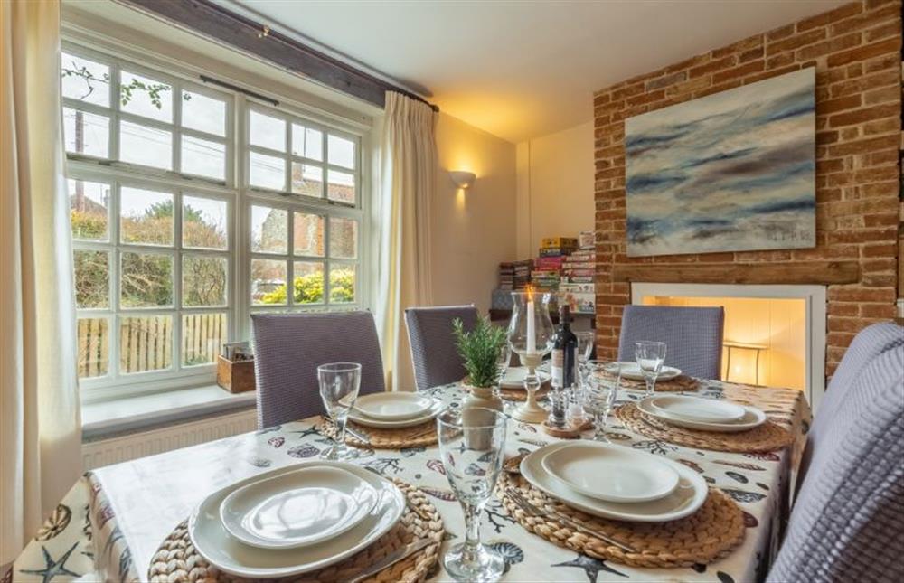 Ground floor: Dining area with window to front of the cottage at Weavers Cottage, Docking near Kings Lynn