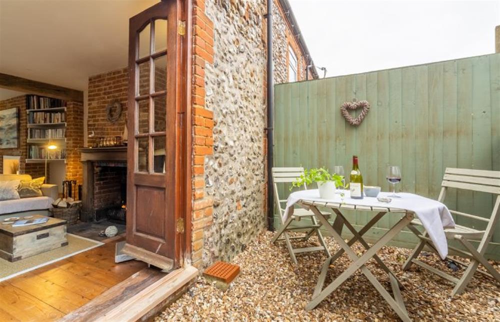 Ground floor: Doors open to the courtyard at Weavers Cottage, Docking near Kings Lynn