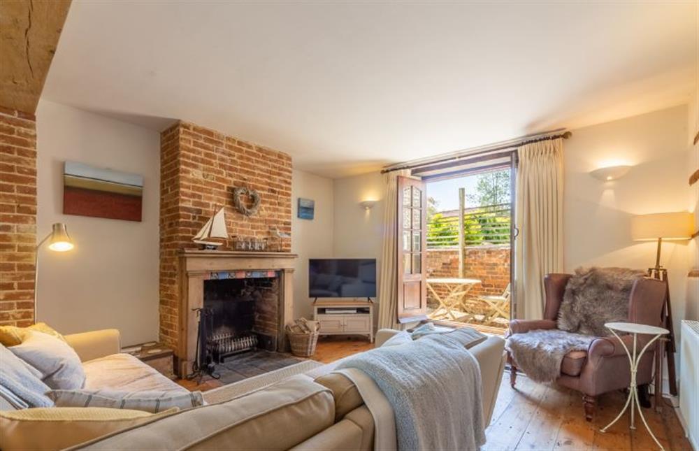 Ground floor: The sitting room has french doors at Weavers Cottage, Docking near Kings Lynn