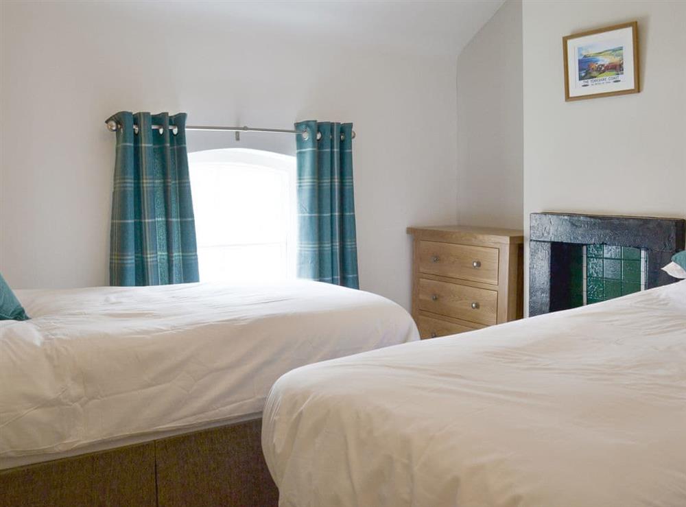 Comfortable twin bedroom at Weavers Cottage in Pickering, North Yorkshire