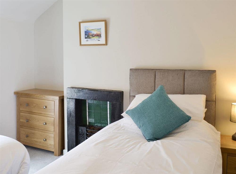 Light and airy twin bedroom at Weavers Cottage in Pickering, North Yorkshire