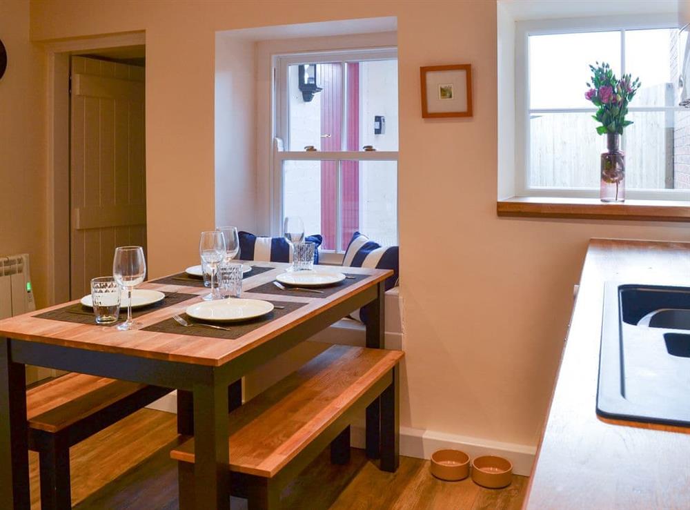 Spacious dining area within kitchen at Weavers Cottage in Pickering, North Yorkshire