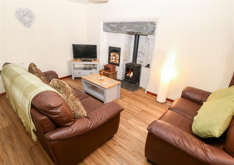 Relax in the living area at Weavers Cottage, Tremadog