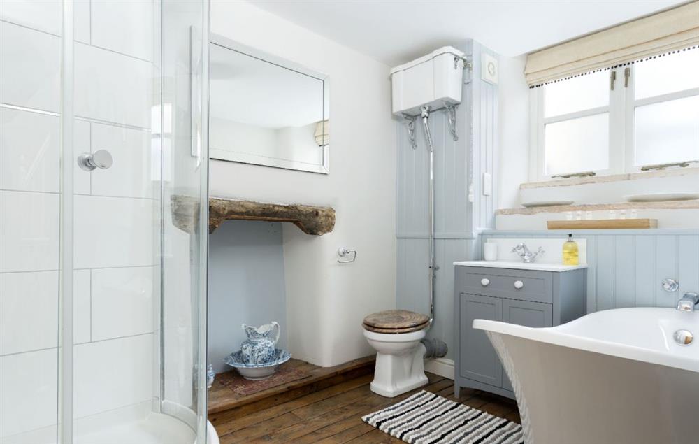 First floor: Bathroom with slipper bath and separate shower at Weavers Cottage, Watledge