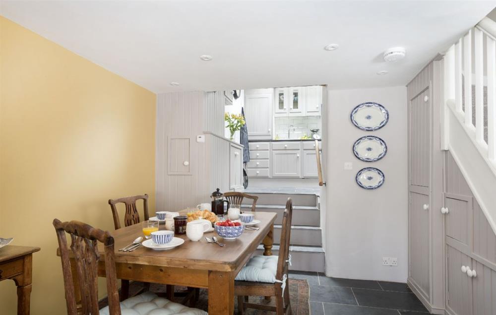 Ground floor: Dining room with steps to kitchen at Weavers Cottage, Watledge