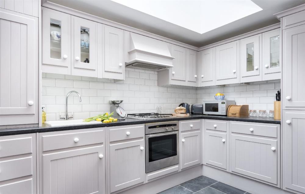 Ground floor: Kitchen with skylight at Weavers Cottage, Watledge