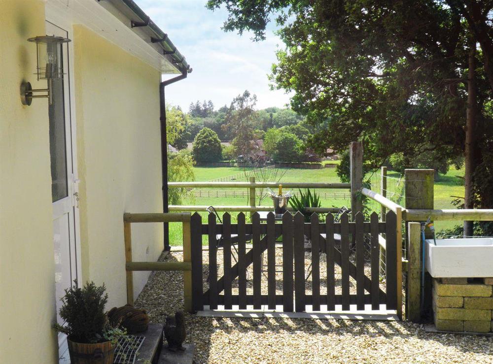 Property, with charming out door seating area at Weavers Lodge in North Gorley, near Fordingbridge, Hampshire