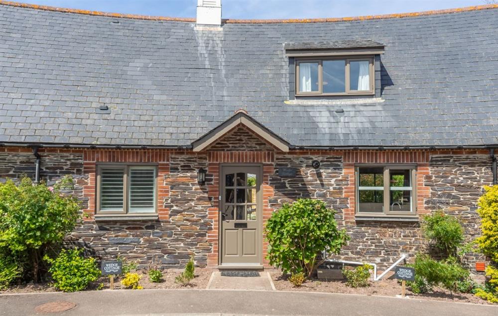 Wedge Cottage is a stunning holiday home located in the Curved Stables at Roserrow