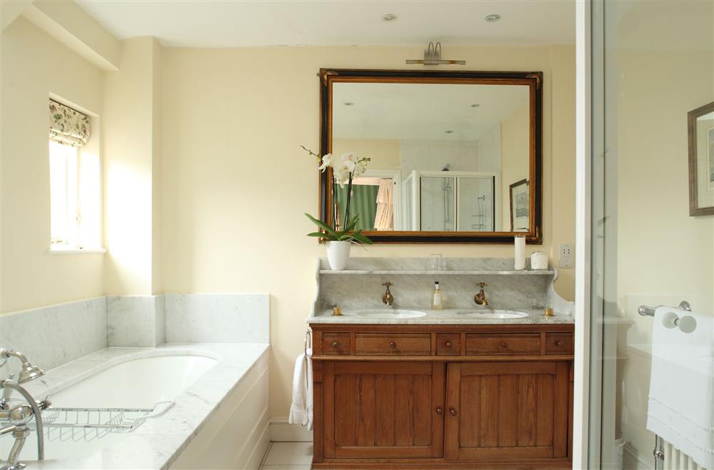 Bedroom five is served by an en-suite bathroom  at Weir House, Bruern, near Chipping Norton