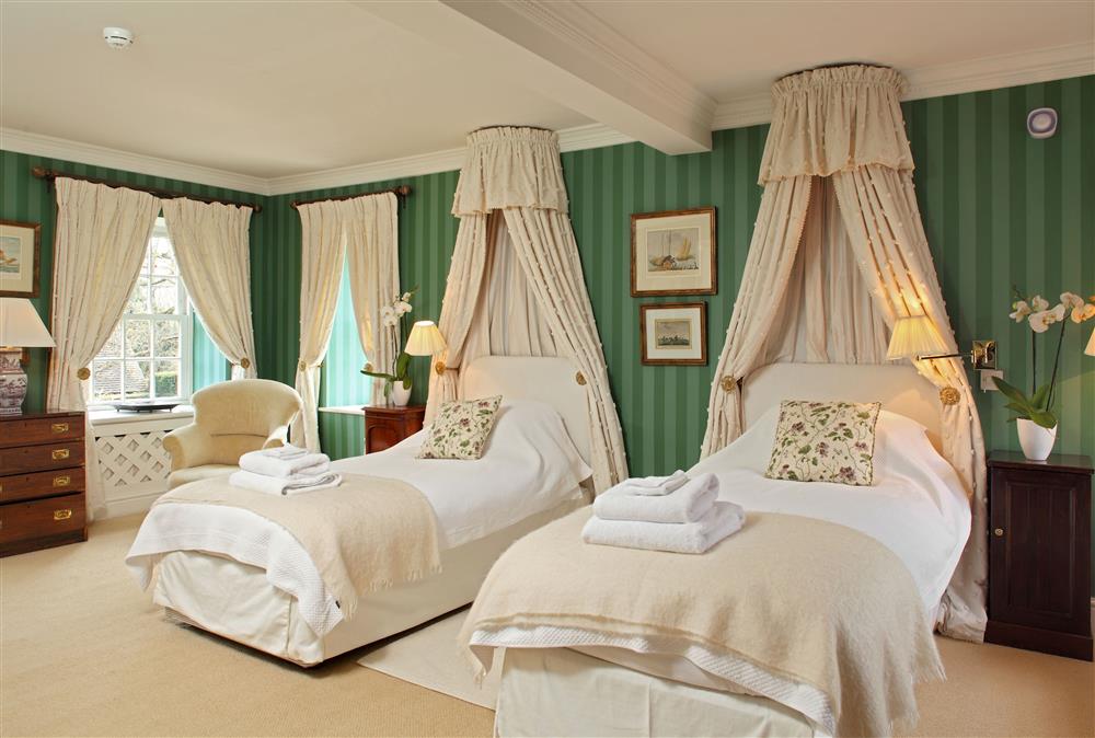 Bedroom two on the ground floor, with 3’ twin single beds at Weir House, Bruern, near Chipping Norton