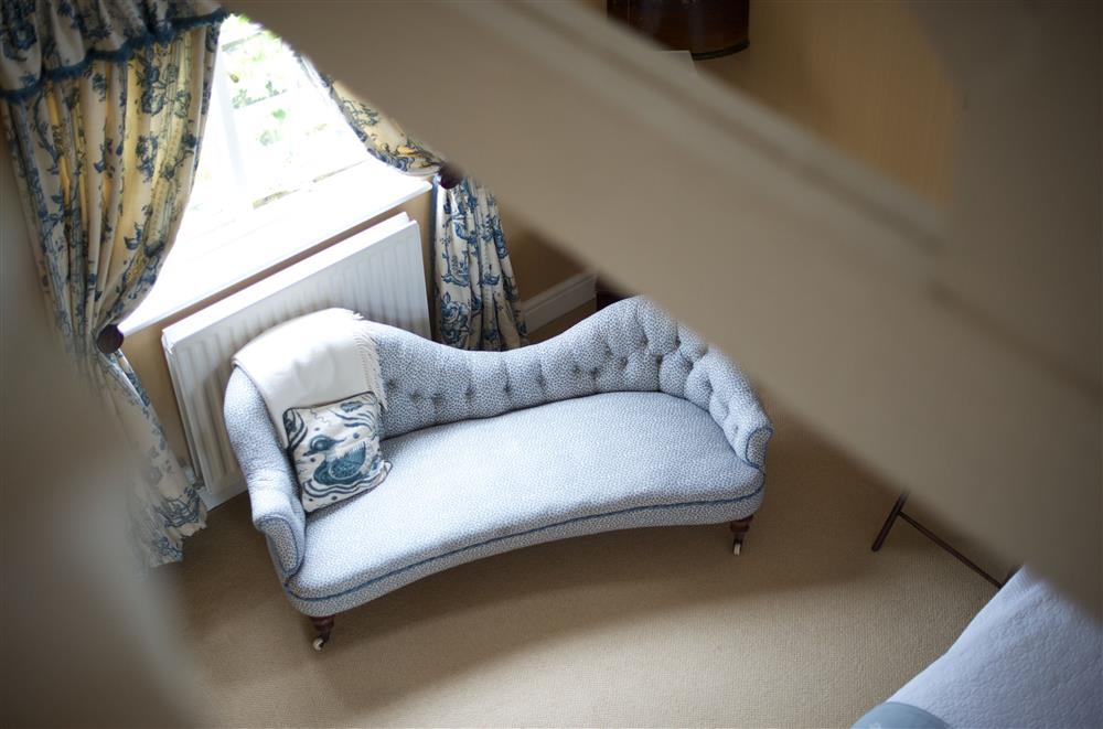 Relax on the chaise longue in bedroom four  at Weir House, Bruern, near Chipping Norton