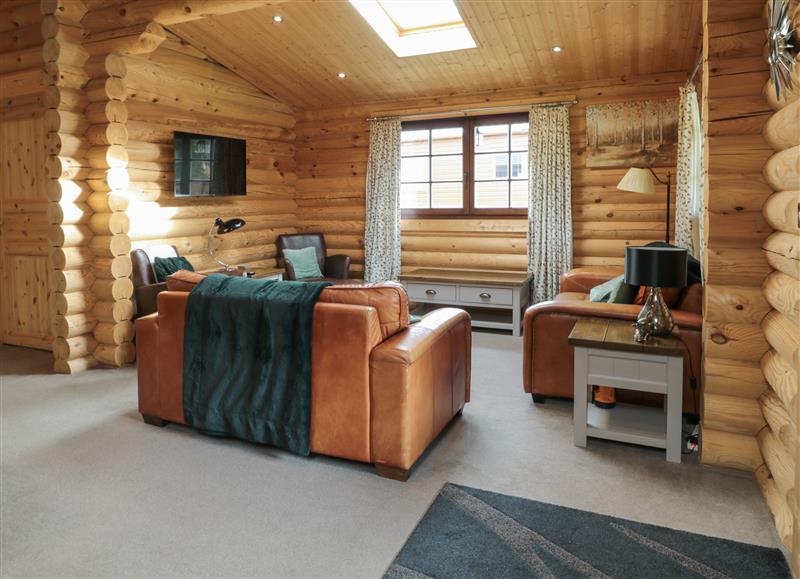 Enjoy the living room at Welcome Hjem Log Cabin, Morpeth near Felton