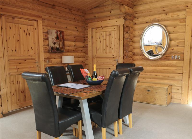 Relax in the living area at Welcome Hjem Log Cabin, Morpeth near Felton