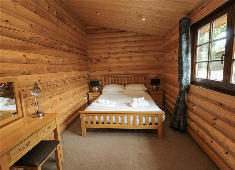 This is a bedroom at Welcome Hjem Log Cabin, Morpeth near Felton