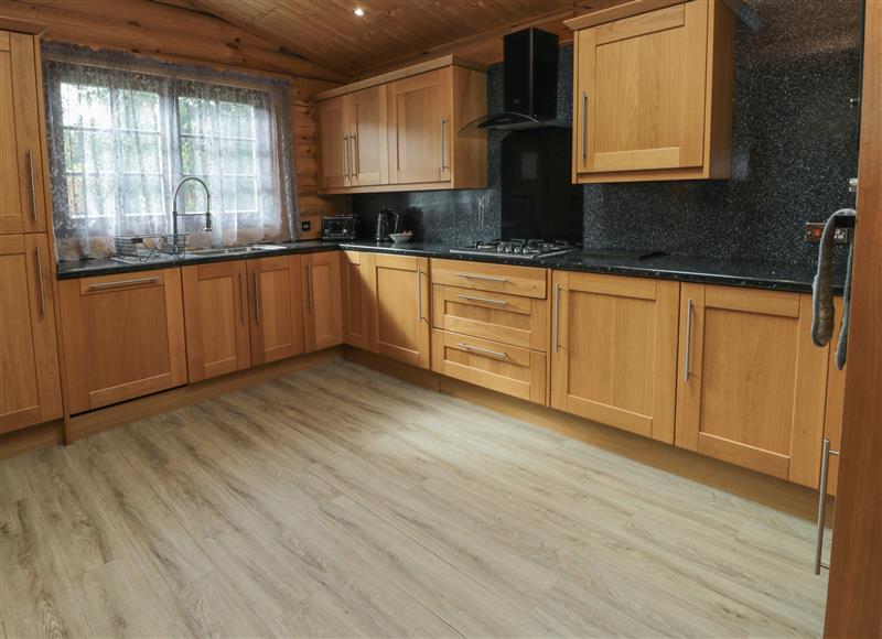 This is the kitchen at Welcome Hjem Log Cabin, Morpeth near Felton