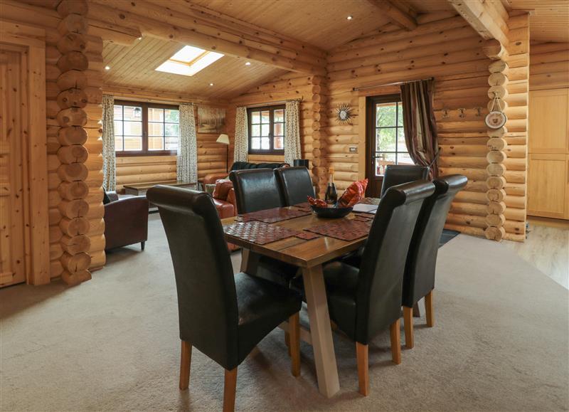 This is the living room (photo 2) at Welcome Hjem Log Cabin, Morpeth near Felton