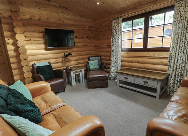 This is the living room at Welcome Hjem Log Cabin, Morpeth near Felton