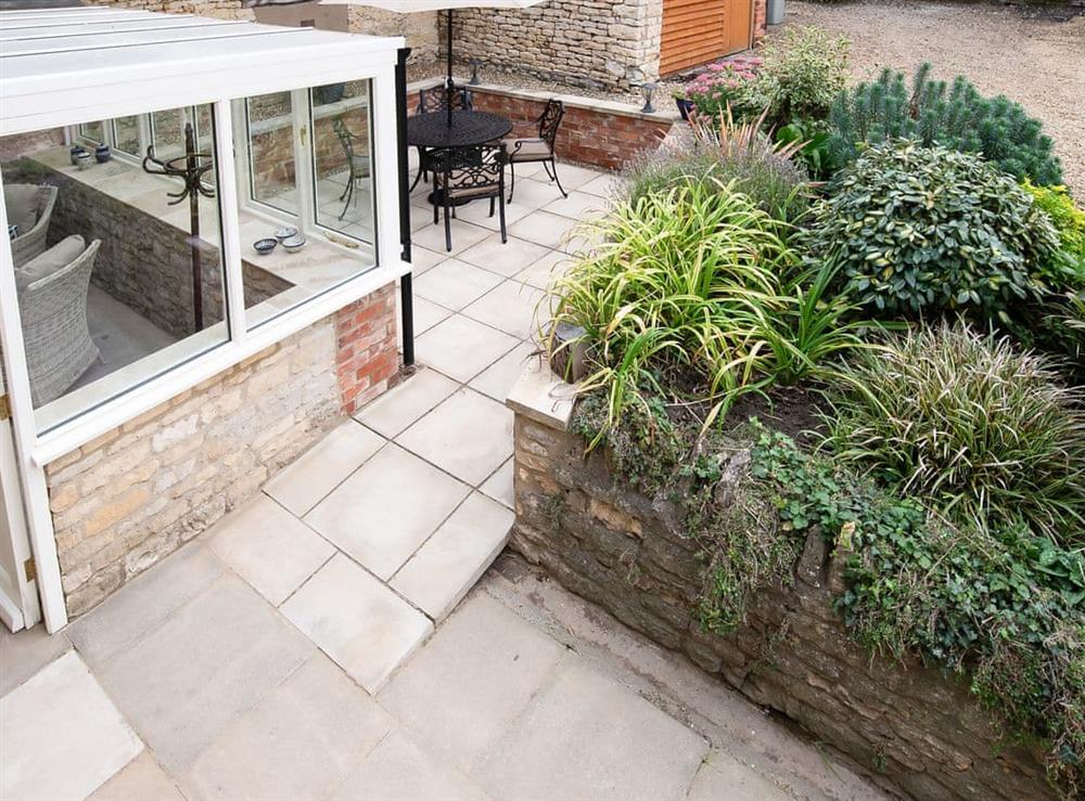 Patio at Well Cottage in Cottesmore, near Oakham, Rutland, Leicestershire