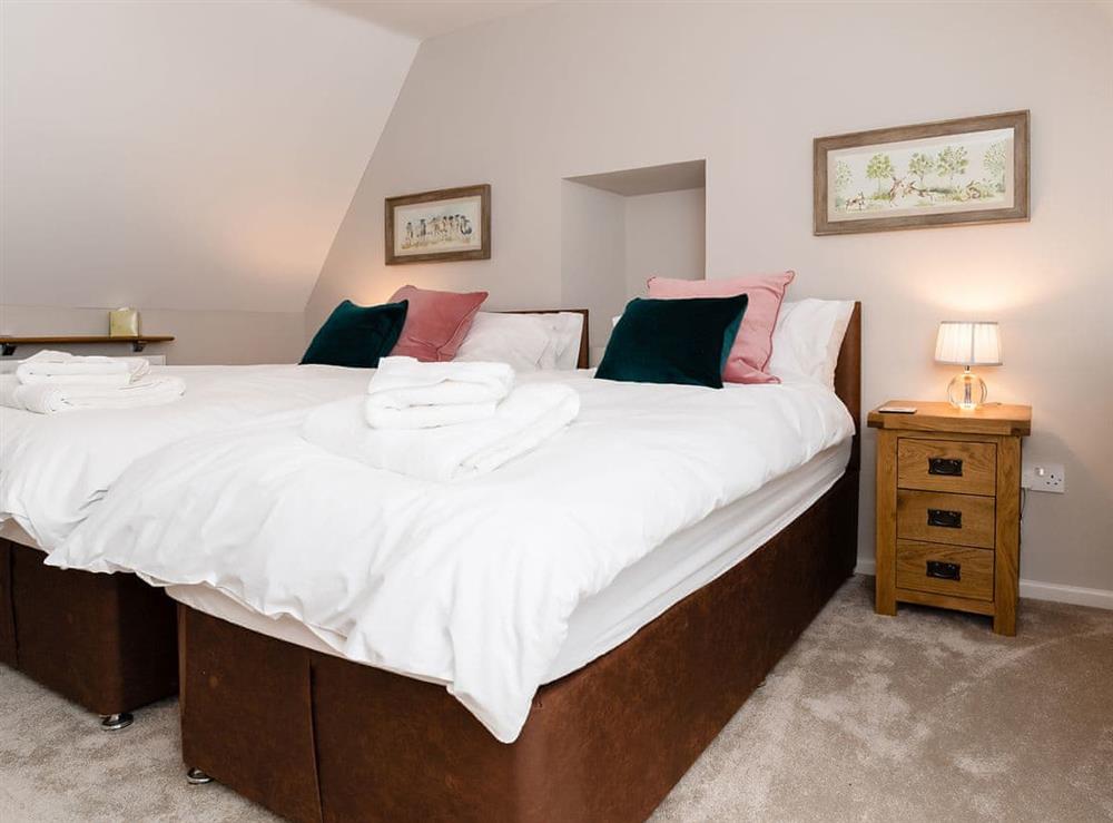 Twin bedroom at Well Cottage in Cottesmore, near Oakham, Rutland, Leicestershire