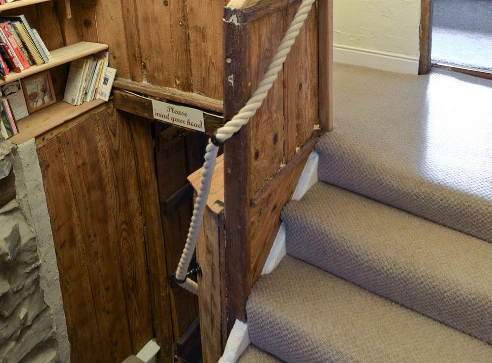 Switchback stairway with library feature